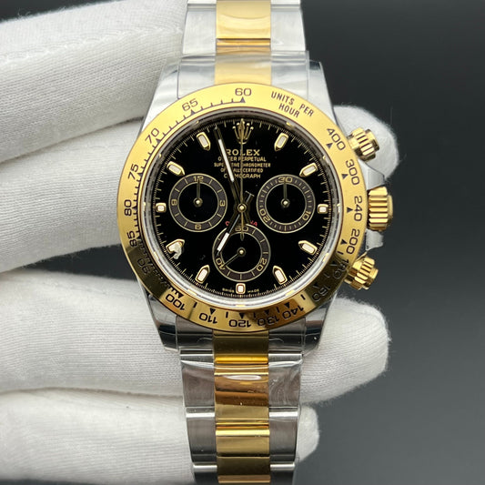 Daytona acciaio oro giallo 18k quadrante nero